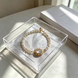vintage lustrous moonstone & pearl bracelet hand woven craftsmanship elegant healing aesthetic statement bangle