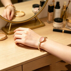 dawn's soft glow natural rose quartz bangle hand woven artisan craftsmanship elegant healing statement bracelet